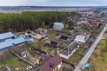 The aerial view of the destroyed and burnt buildings. The buildings were destroyed by russian rockets and mines. The Ukrainian cities after the russian occupation.