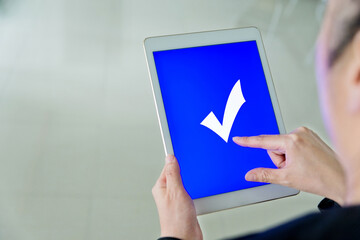 People using digital tablet  voting online