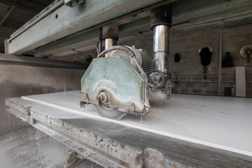 machine with cutting disc for marble slabs