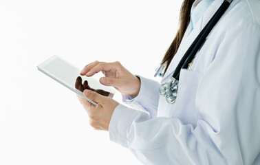 Doctor working on digital tablet against white background