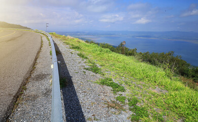 curve road on the hill and sky background.