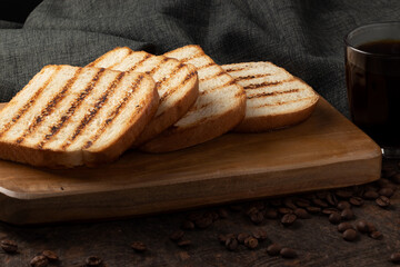 Delicious butter toasted bread served with coffee.