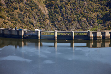 Reservoir. Construction in the bed of a river or stream to partially or totally close its channel