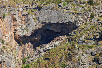 Grotto. Cave in the rocks of a mountain