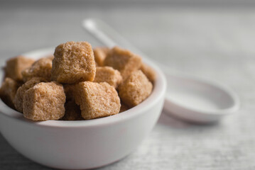 White sugar and brown sugar background. Sweet and tasty. Healthy and unhealthy lifestyle. 