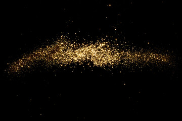 Fototapeta na wymiar Golden blurred bokeh lights on black background. Glitter sparkle stars for celebrate. Overlay for your design