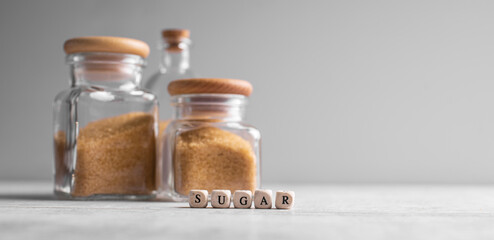 White sugar and brown sugar background. Sweet and tasty. Healthy and unhealthy lifestyle. 