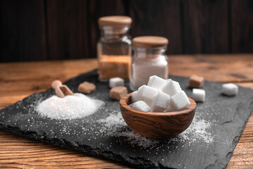 White sugar and brown sugar background. Sweet and tasty. Healthy and unhealthy lifestyle. 