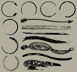 Collection of vintage style brush strokes and circular ink smudges. 