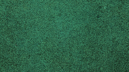 close up view of green textile rubber floor use as background. running track floor finishing for...