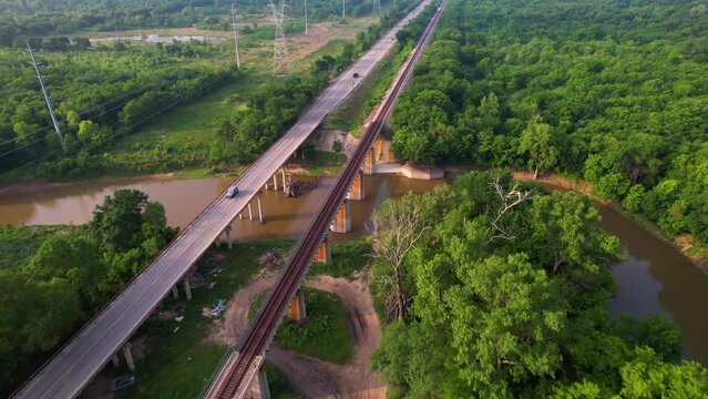 Aerial footage of highway 377 over Denton Creek in Texas. Camera is heading south.