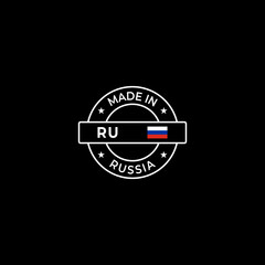 Made in Russia stamp design on black background with Russian flag