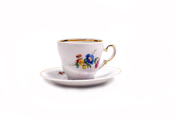 vintage tea cup and saucer isolated on white background