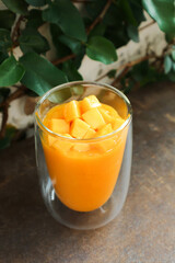 mango smoothie or mango yogurt smoothie , blended mango