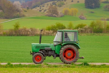 Gordijnen Oldtimer vintage agricultural tractor © Gaschwald