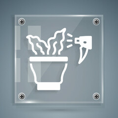 White Spraying a house plant with a spray gun icon isolated on grey background. Moistening of foliage. Care for home flowers. Square glass panels. Vector