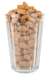 Dried almonds in a faceted glass beaker isolated on white background