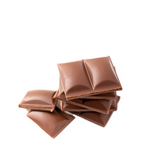 Slices of delicious milk chocolate isolated on white background. Chocolate bar. Sweets with cocoa butter.