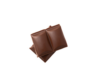 Slices of delicious milk chocolate isolated on white background. Chocolate bar. Sweets with cocoa butter.