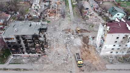The war in Ukraine, Borodyanka, rescuers are removing the rubble of an apartment building, drone...