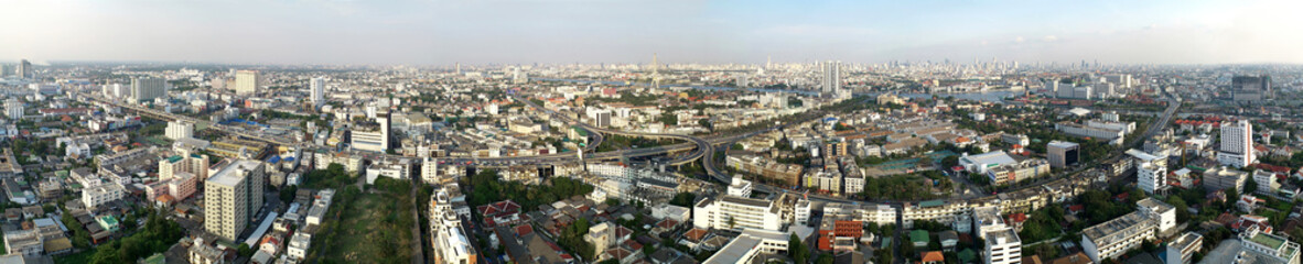 Aerial view panorama of Thonburi district in Bangkok city and sunset sky and clouds in Bangkok Thailand