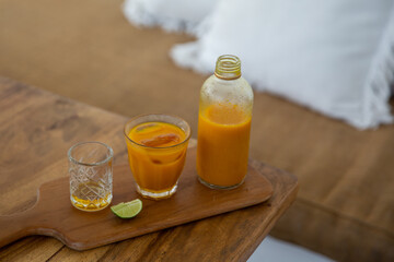 Pure vegan Immunity system booster. Ginger shot with citrus fruits juice and turmeric.