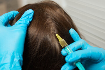 Plasma treatment, plasmolifting or PRP method point the introduction of the patient's own plasma...
