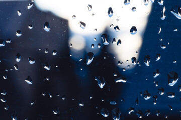 Krople deszczu na szybie - obrazy, fototapety, plakaty