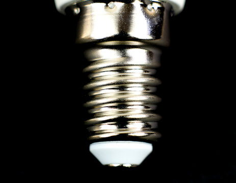 E14 Led bulb base on black background
