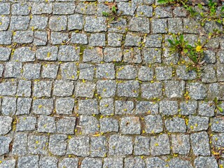 Cobblestone of granite cubes, background