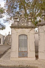 Fototapeta na wymiar ld grave monument in Alto de Sao Joao cemetery in Lisbon, Portugal