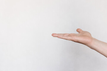 two hands with indicate the direction on a light background