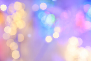 Obraz premium Unfocused, abstract shiny background. Colorful, festive background of shiny lanterns. High quality photo