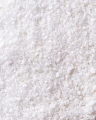 White coarse salt texture background. Top view
