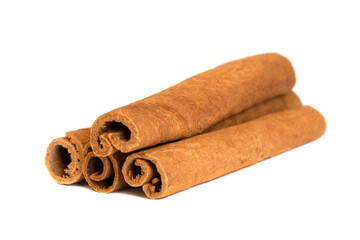 Cinnamon sticks isolated on white background close up