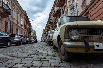 Street with parked cars in the city of Chernivtsi.