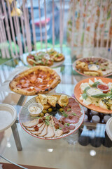 a lot of cold snacks on buffet table, catering.