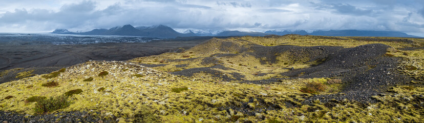 Iceland autumn tundra landscape near Haoldukvisl glacier, Iceland. Glacier tongue slides from the Vatnajokull icecap or Vatna Glacier near subglacial Esjufjoll volcano. Not far from Iceland Ring Road.