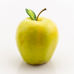 One ripe yellow apple fruit with green leaf isolated on white background with clipping path