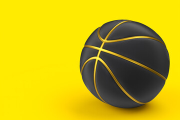 Gold and black basketball ball isolated on yellow background