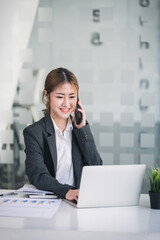 Portrait of a business woman working on a tablet computer in a modern office. Make an account analysis report. real estate investment information financial and tax system concepts
