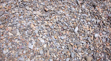 Sea stones background, small rocks