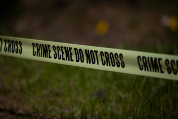 police tape prohibiting crossing the territory