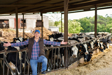 Man cowboy at cow farm ranch