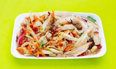 Spicy green papaya salad with vermicelli.