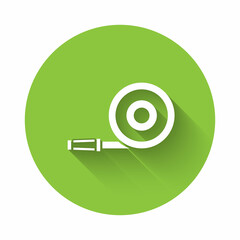 White Fire hose reel icon isolated with long shadow. Green circle button. Vector