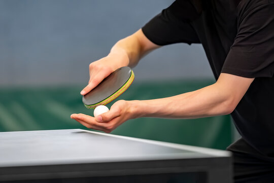 close up of a table tennis player serving