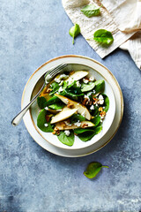 Pear and Spinach Salad with Walnuts and Feta. Top view