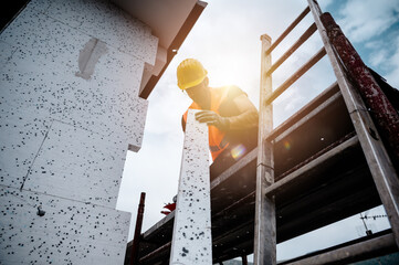 Polystyrene thermal cladding for energy saving on a construction site - obrazy, fototapety, plakaty