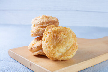 3 cheese puff pastry, displayed on gray background